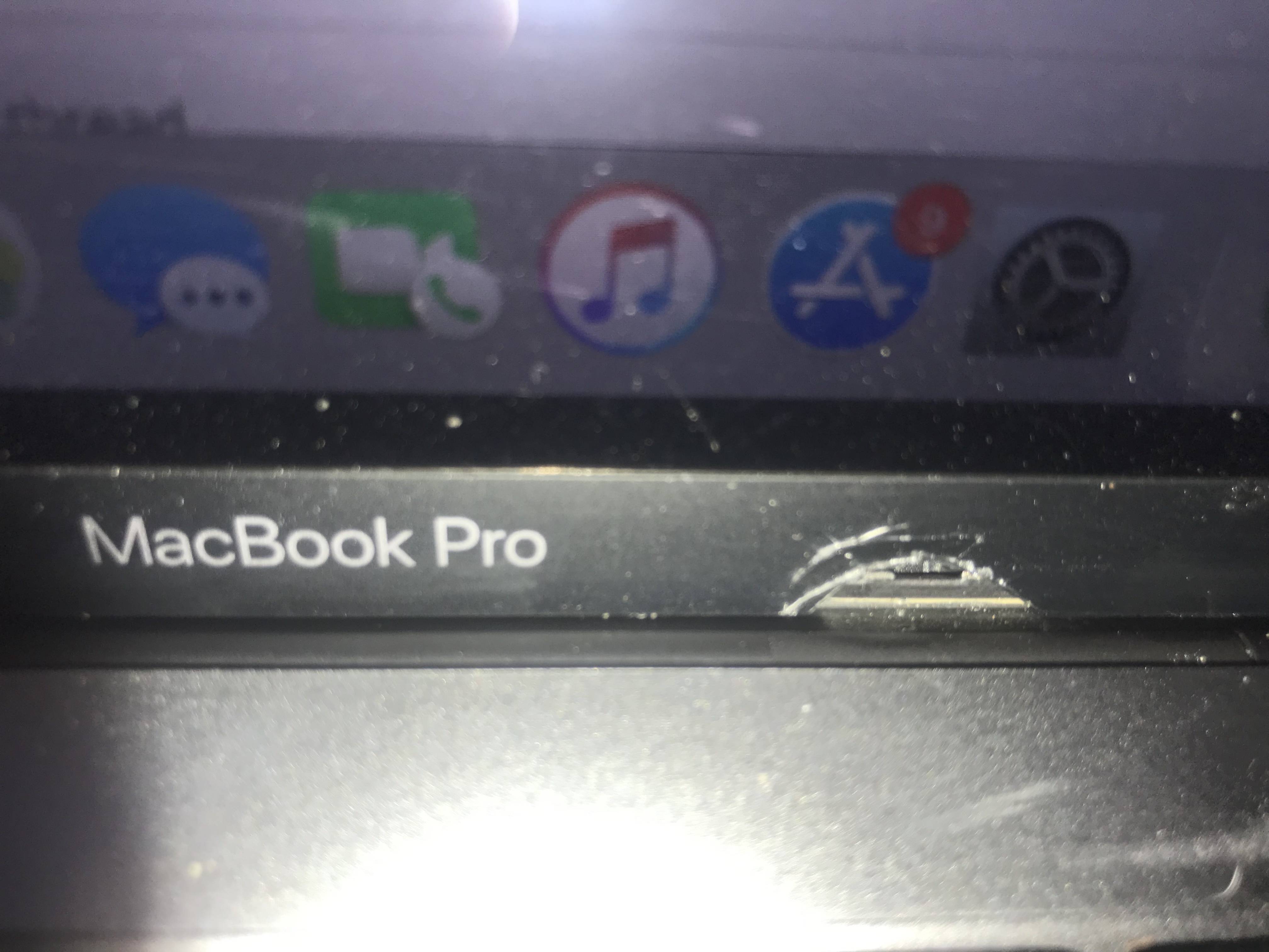 Bezel of Macbook Pro cracked.